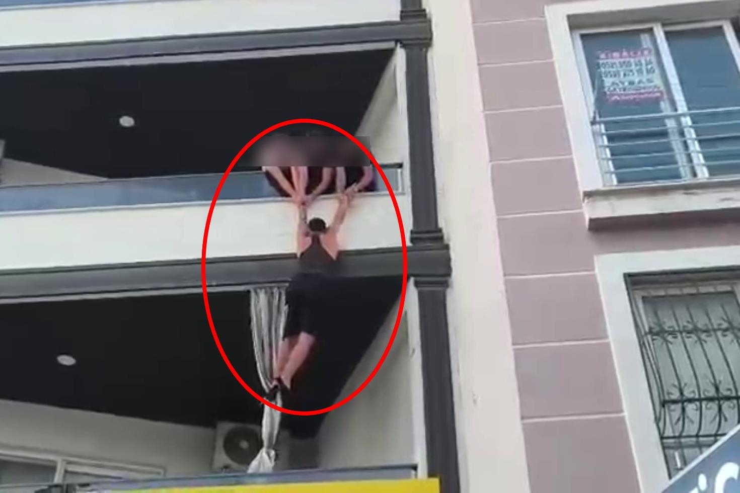 İş yeri kurşunlayan şüphelinin balkondan kaçmaya çalıştığı anlar kamerada